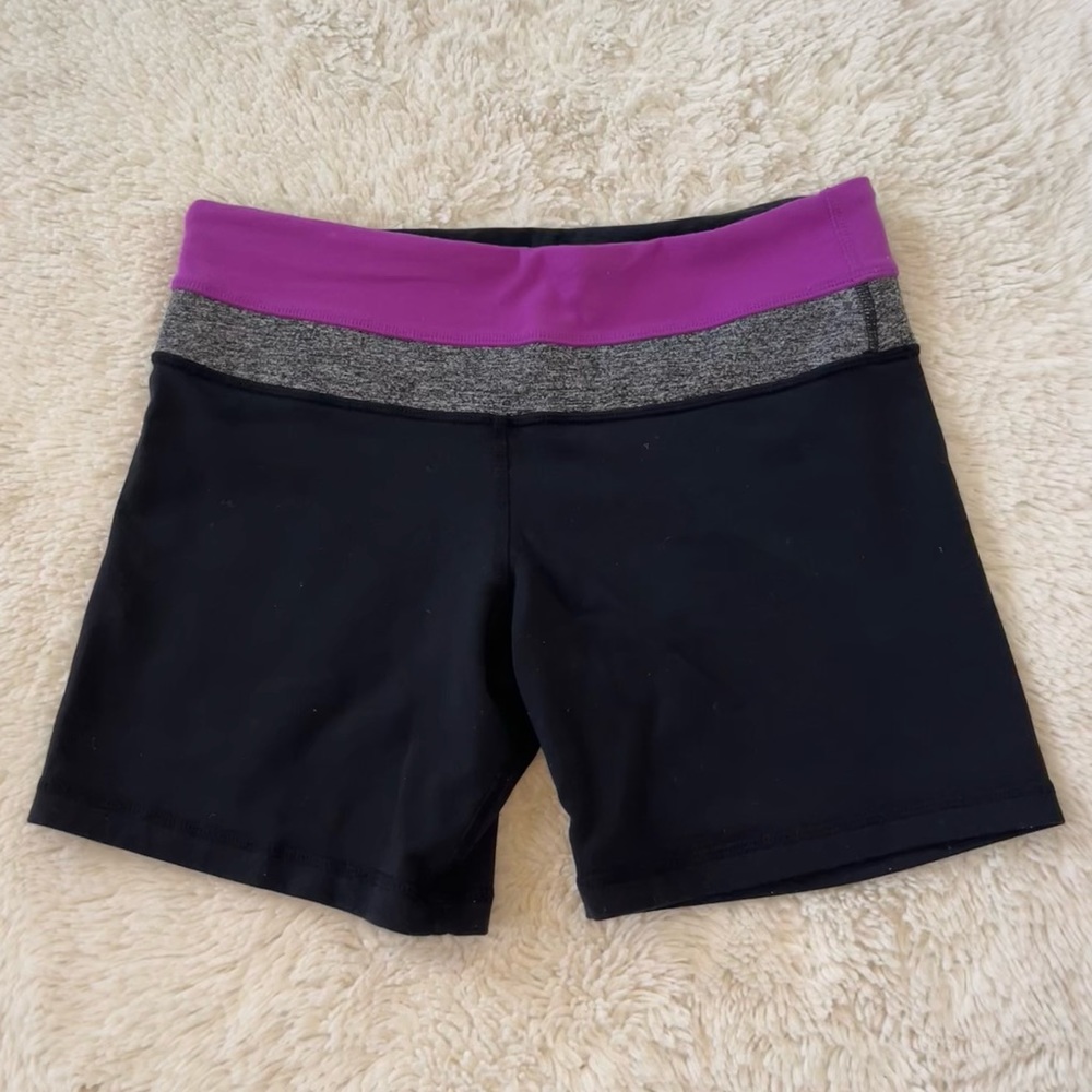 LULULEMON SIZE 4 BLACK SPANDEX WITH PURPLE/GREY BAND